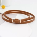 Elegant caramel brown leather belt for women featuring a sleek silver rectangular buckle - Camel