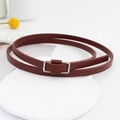 Elegant deep burgundy slim leather belt for dresses with minimalist silver metal buckle - Red Brown