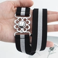 Elastic waist belt with black and white stripes and silver floral hollow buckle - Black and White (EL231)