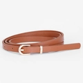 Minimalist brown slim leather belt for women featuring a gold metal buckle set - Camel