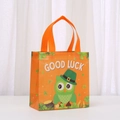 Detail of St. Patrick’s Day gift bag with owl print, shamrocks and Good Luck text - Orange Owl Style (9025-5)