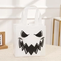 Halloween gift bag in white non-woven fabric with a black and white ghost face design - 9014-8