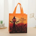 Detail of Halloween non-woven gift bag featuring spooky scarecrow and bat prints - Orange Scarecrow Full Moon Style (5007-2)