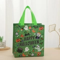 Detail of green Halloween non-woven gift bag with spooky cartoon ghost and pumpkin prints - Green Ghost Pumpkin Cartoon Style (5007-4)