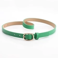 Slim women's leather belt in bright green with an oval golden metal buckle for trousers - Green