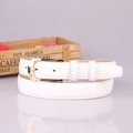 Women's slim white PU leather belt featuring an ornate gold heart buckle and a classic pin closure - White