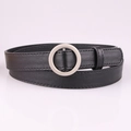 Minimalist black leather belt for women featuring a round silver metal buckle - Black