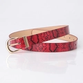 Women's faux snakeskin belt in vibrant red with a golden horseshoe buckle - Red