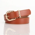 Slim brown faux leather belt for women featuring a gold bamboo-style metal buckle - Camel