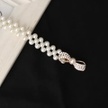 Elegante catena in vita a doppia fila di perle con chiusura a fiocco di strass lucidi - Stile Fiocco (8130)