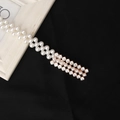 Elegante doppelreihige Perlen-Taillenkette mit dreireihiger Strass-Schließe in Roségold - Matrix Strass Stil (8129)