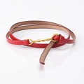 Women's slim red leather belt featuring a unique gold-tone twisted metal buckle - Twisted Buckle Style (794#) / Red