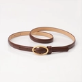 Women's slim dark brown leather belt featuring a classic golden oval metal buckle - Coffee