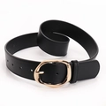 Women's black faux leather belt with minimalist golden oval buckle and fine texture - Black