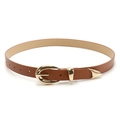 Slim brown leather belt for women featuring a gold horseshoe buckle and metal tip accents - Camel