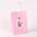 Detail of pink kraft paper gift bag with Baby Girl illustration and white rope handles - 101-2 Pink Baby Stroller
