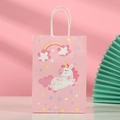 Detail of pink unicorn paper gift bag featuring cute cartoon print and twisted rope handle - 404-1 Style (Medium Pink Unicorn)