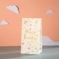 Detail of white Happy Birthday gift bag with gold lettering and colorful party patterns - 24x13x8 / White