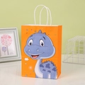 Sacchetto regalo in carta kraft arancione con dinosauro blu e manici in corda bianca resistenti - Stile Dinosauro Arancione / 21x15x8cm