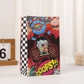 Close-up of paper gift bag with zombie monster truck print and racing flag pattern - Zombie Skull Monster Truck Style (H005-8) / 22x13x8