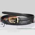 Detailed macro view of black slim leather belt with a classic gold pin buckle on magazines - Black / 105cm