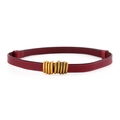Deep red leather waist belt for women with a spiral golden metal buckle in variant view - Red / 100cm