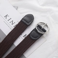 Deep brown woven belt with silver circular buckle on minimalist Kinfolk magazine background - Short Style / Round Buckle Coffee