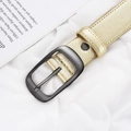 Champagne gold textured leather belt for women featuring a sleek dark metal pin buckle - One Size / Gold