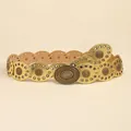 Detail of bohemian gold metal belt featuring sunburst embossing and hollow-out oval links - Antique Copper Gold