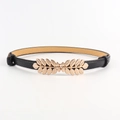 Ceinture élastique noire pour femme dotée d'une boucle élégante en feuille dorée - Noir