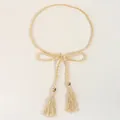 Detail of woven fringe waist belt with elegant bow knot and polished gold beads - Off White