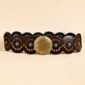 Macro view of vintage western leather belt with turquoise inlay and carved buckle - Antique Bronze Coffee