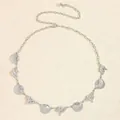 Detailed view of bohemian silver metal shell waist chain with lobster clasp and shells - Silver