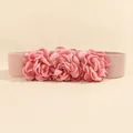 Detailed view of 3D satin rose petals and elastic woven texture on the wide waist belt - Pink