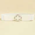 Close-up of white elastic waist belt with gold clover buckle and textured PU leather - White