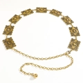 Cintura a catena vintage dorata con maglie rettangolari a sbalzo e motivi classici - Oro Antico