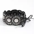 Detail of bohemian black leather waist belt with silver metal discs and eyelet studs - 160cm / Thin Round Rope Style / Bright Silver Black