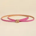 Detail of rose pink slim belt showing 3D golden rose buckle and adjustable eyelets - Rose Red