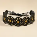 Detail of bohemian belt featuring black leather discs and embossed sun flower rivets - Bronze Black