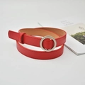 Detail of slim red leather belt featuring a round silver buckle on a grey background - Round Buckle / Red