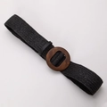 Close-up of black woven belt texture with a vintage brown round wooden buckle - Black With Oval Wood Buckle