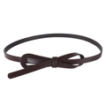 Close-up of a slim dark brown faux leather belt featuring a decorative bow knot detail - Coffee