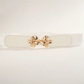 Detailed close-up of white elastic waist belt with elegant golden butterfly buckle - White