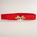 Detail of red elastic waist belt featuring a gold bow buckle and faux leather accents - Red