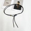 Detail of minimalist black thin waist cord with silver sliding metal adjustment buckle - Black