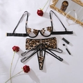 Macro detail of leopard print lingerie set with golden metal rings and lace-up straps - S / Black Leopard