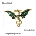 Spilla drago dorato con ali in smalto verde e strass per abiti, misura 6,2cm x 4,0cm - Verde