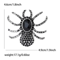 Vintage silver spider brooch with black rhinestones and oval gemstone, size 4.6x4.9cm - Black
