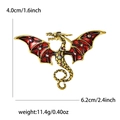 Spilla a forma di drago in metallo dorato con ali in smalto rosso e strass brillanti - Rosso