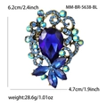 Luxe goudkleurige broche met grote blauwe kristal en sprankelende strassteentjes - Blauw